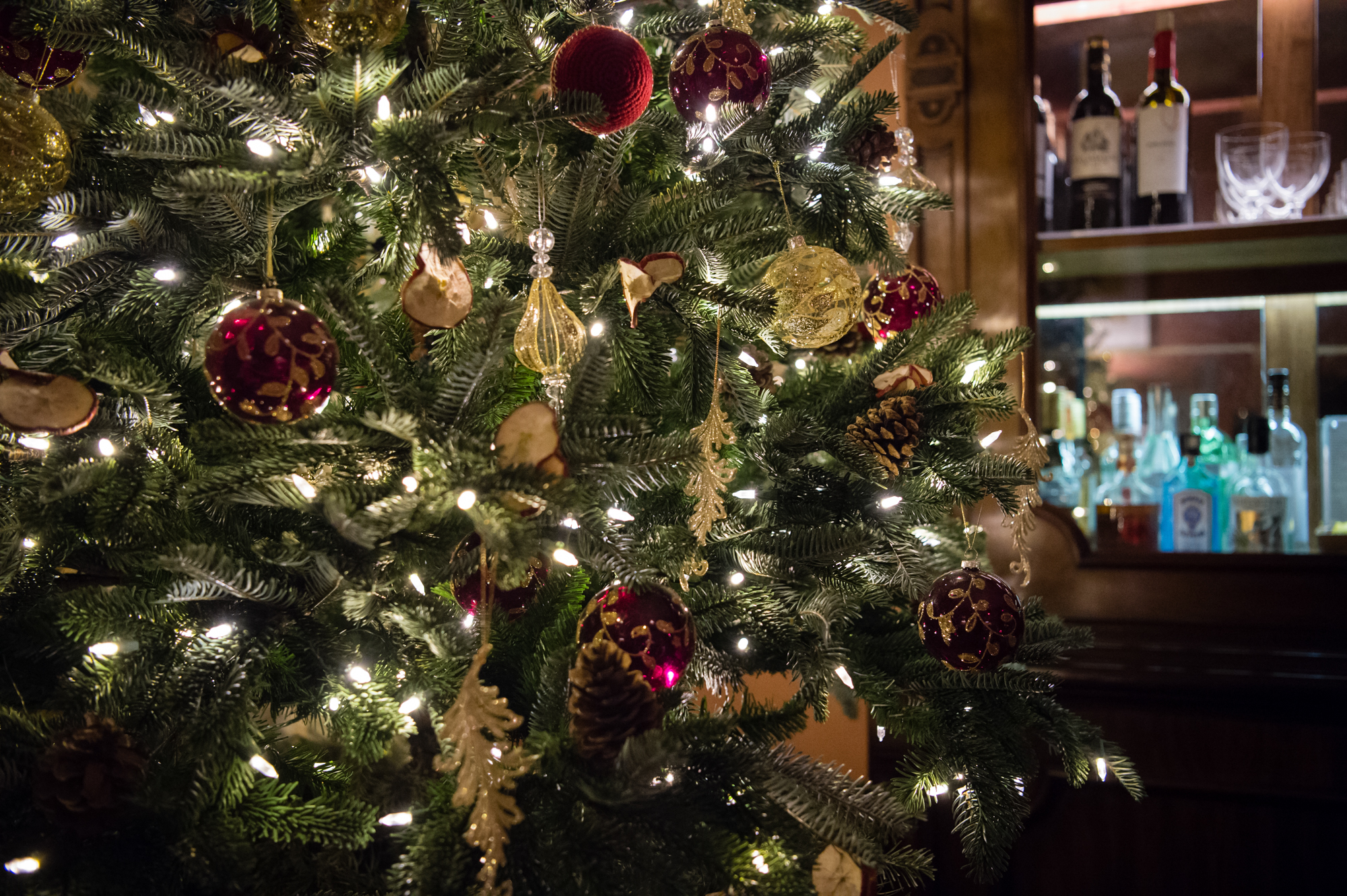 A christmas tree in a hotel bar